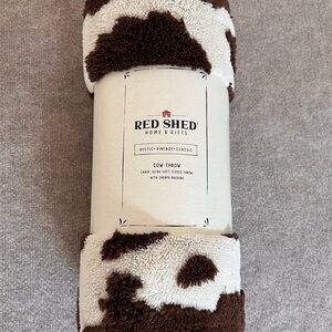Red Shed Brown and White Cow Throw Blanket